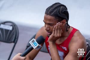 Nebraska Cornhusker James Ledbetter gets interviewed during the Big Ten OTF Championships on May 17, 2026, in Lincoln, Nebraska. Photo by Brandon Tiedemann.