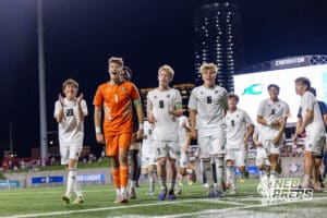 Lincoln Southwest is celebrating as a team while they head over to there fans to celebrate with them after winning a high school state semifinals soccer game against Papio South on Friday, May 15 2026 in Omaha, Nebraska. Photo By Jack Stephens.