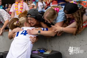 Omaha Marian’s Paige Miller (14) is embracing her loved ones in the crowd after winning a high school state semifinals soccer game against Kearney on Friday, May 15 2026 in Omaha, Nebraska. Photo By Jack Stephens.