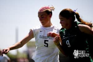 Elkhorn South’s Aubrey Marsh (5) is fighting through contact against Lincoln Southwest during semi-finals of the NSAA State Soccer Championships on Friday, May 15, 2026, in Omaha, Nebraska. Photo By Jack Stephens.