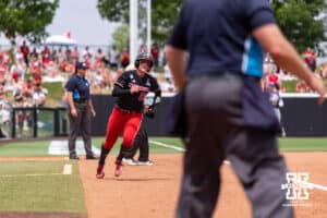 Nebraska Cornhusker starting pitcher/relief pitcher Jordy Frahm (98) runs home to score a run against the Grand Canyon Antelopes in the fifth during the NCAA Softball Regionals on Saturday, May 16, 2026, in Lincoln, Neb. Photo by John S. Peterson.