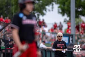 Nebraska Cornhusker head coach Rhonda Revelle watches the action on the field coaching from third base against the Grand Canyon Antelopes in the fifth inning during the NCAA Softball Regionals on Saturday, May 16, 2026, in Lincoln, Neb. Photo by John S. Peterson.