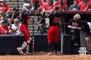 Nebraska Cornhusker catcher Jesse Farrell (25) and Nebraska Cornhusker starting pitcher Jordy Frahm (98) give each other high fives during the NCAA Softball Regionals on Saturday, May 16, 2026, in Lincoln, Neb. Photo by John S. Peterson.