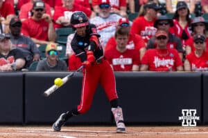 Nebraska Cornhusker outfielder Hannah Coor (23) hits a single in the first inning during the NCAA Softball Regionals on Saturday, May 16, 2026, in Lincoln, Neb. Photo by John S. Peterson.