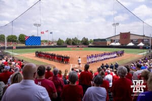 Nebraska Cornhuskers and Grand Canyon Antelopes lined up for the National Anthem during the NCAA Softball Regionals on Saturday, May 16, 2026, in Lincoln, Neb. Photo by John S. Peterson.