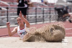 Nebraska Cornhusker Timeke-Jade Coetzee lands in the sand pit during the Big Ten OTF Championships on May 16, 2026, in Lincoln, Nebraska. Photo by Brandon Tiedemann.