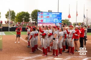 Nebraska Cornhuskers celebrates the fans sood8the win over the South Dakota Coyotes, with the fans during the first round of the NCAA Softball Regionals on Friday, May 15, 2026, in Lincoln, Neb. Photo by John S. Peterson.