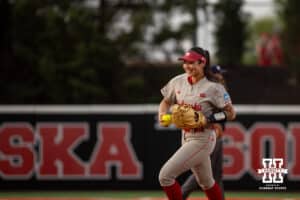Nebraska Cornhusker infielder Bella Bacon (3) makes a catch an out to end the game against the South Dakota Coyotes in the seventh inning during the first round of the NCAA Softball Regionals on Friday, May 15, 2026, in Lincoln, Neb. Photo by John S. Peterson.