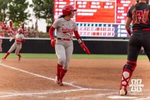 Nebraska Cornhusker Kennadi Williams (15) scores a run in the sixth inning against the South Dakota Coyotes during the first round of the NCAA Softball Regionals on Friday, May 15, 2026, in Lincoln, Neb. Photo by John S. Peterson.