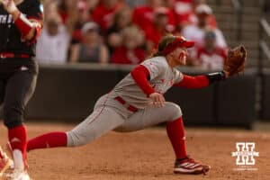 Nebraska Cornhusker starting pitcher/relief pitcher Jordyn Frahm (98) stretches to make the out at first against the South Dakota Coyotes in the fifth inning during the first round of the NCAA Softball Regionals on Friday, May 15, 2026, in Lincoln, Neb. Photo by John S. Peterson.