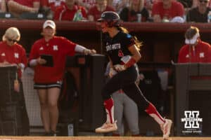 South Dakota Coyote Autumn Iversen (4) heads to home plate after hitting a home run in the fourth inning against the Nebraska Cornhuskers during the first round of the NCAA Softball Regionals on Friday, May 15, 2026, in Lincoln, Neb. Photo by John S. Peterson.