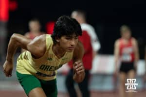 Oregon Duck Juan Gonzalez warms up before the men’s 10,000 during the Big Ten OTF Championships on May 15, 2026, in Lincoln, Nebraska. Photo by Brandon Tiedemann.