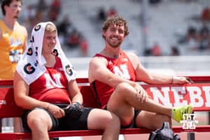 Nebraska Cornhusker Gustav Rydaker and Max Herman sit on the bench during the Big Ten OTF Championships on May 15, 2026, in Lincoln, Nebraska. Photo by Brandon Tiedemann.