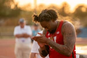 Nebraska Cornhusker Keyshawn Strachan claps after his throw during the Big Ten OTF Championships on May 15, 2026, in Lincoln, Nebraska. Photo by Brandon Tiedemann.