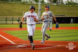 Omaha Maverick Hayden Lewis touches home plate during a baseball game at Tal Anderson Field on May 14, 2026 in Omaha Nebraska. Photo by Collin Stilen.