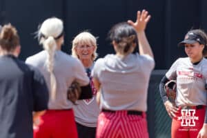 Nebraska Cornhusker head coach Rhonda Revelle meeting with the team during practice for the first round of the NCAA Championships on Thursday, May 14, 2026, in Lincoln, Neb. Photo by John S. Peterson.