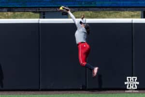 Nebraska Cornhusker Natalia Hill (27) makes a catch at the wall during practice for the first round of the NCAA Championships on Thursday, May 14, 2026, in Lincoln, Neb. Photo by John S. Peterson.