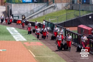 Nebraska Cornhuskers take the field during practice for the first round of the NCAA Championships on Thursday, May 14, 2026, in Lincoln, Neb. Photo by John S. Peterson.