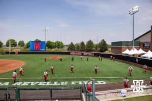 Nebraska Cornhuskers warm up for practice during practice for first round of the NCAA Championships on Thursday, May 14, 2026, in Lincoln, Neb. Photo by John S. Peterson.