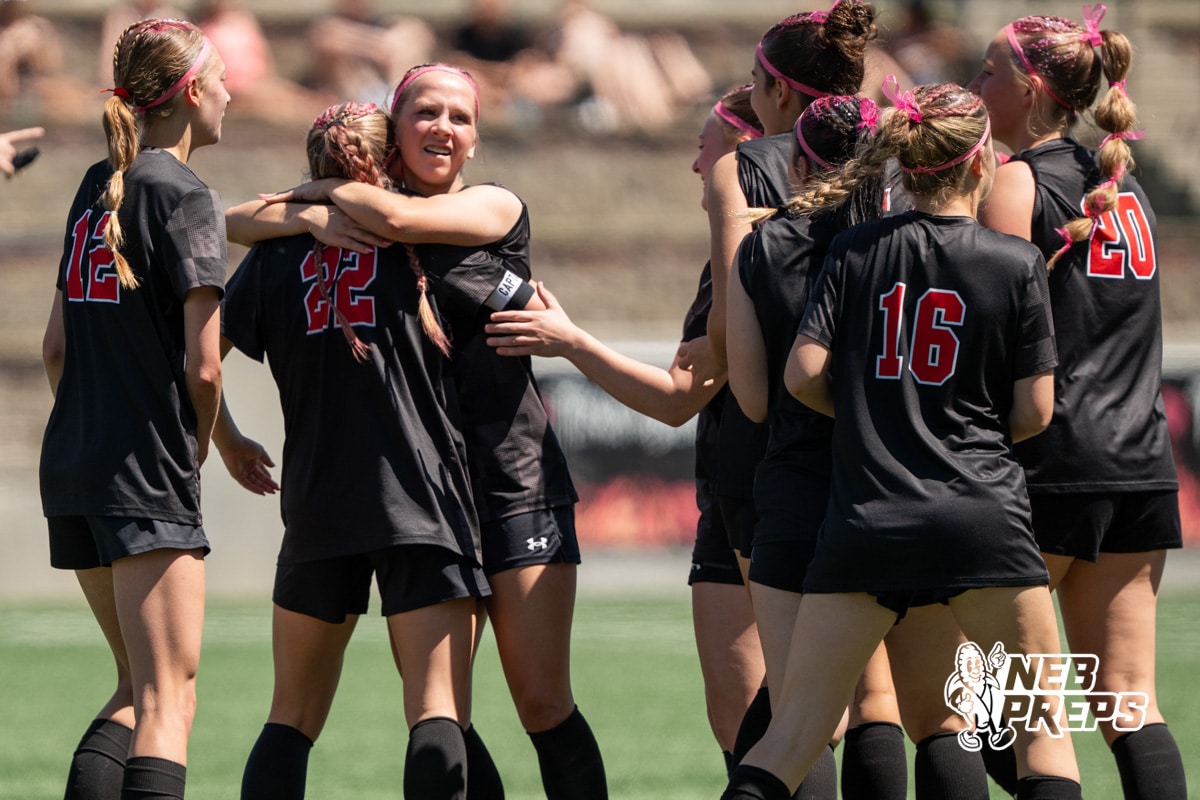 2026 Girls Soccer B2 Elkhorn vs Kearney Catholic | Hurrdat Sports Elkhorn's Olivia Thompson (22) celebrates a goal with sister Elly Thompson (14) against Kearney Catholic during the girls Class B quarter-finals soccer match on Wednesday, May 13, 2026, in Omaha, Nebraska. Photo by Jackson D. Luethje.