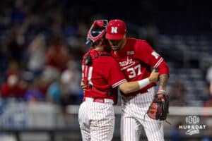 Nebraska Cornhusker pitcher J'shawn Unger (37) gives catcher Trey Fikes (21) after the win over the Creighton Bluejays during a college baseball game on Tuesday, May 12, 2026, in Omaha, Neb. Photo by John S. Peterson.