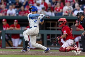 Creighton Bluejay Ben North (11) hits a single in the sixth inning against the Nebraska Cornhuskers during a college baseball game on Tuesday, May 12, 2026, in Omaha, Neb. Photo by John S. Peterson.