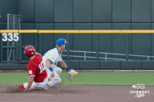 Nebraska Cornhusker Drew Grego (10) slides into second base during a college baseball game on May 12, 2026, in Omaha, Nebraska. Photo by Brandon Tiedemann.