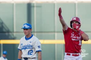 Nebraska Cornhusker Drew Grego (10) celebrates a double during a college baseball game on May 12, 2026, in Omaha, Nebraska. Photo by Brandon Tiedemann.