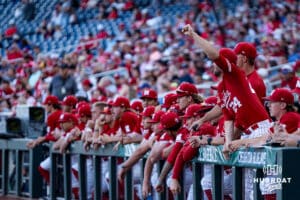 Nebraska Cornhusker Caleb Clark (24) cheers on the bench during a college baseball game on May 12, 2026, in Omaha, Nebraska. Photo by Brandon Tiedemann.