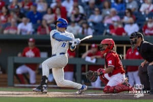 Creighton Bluejay infielder Ben North (11) grounds out in to a double-play against the Nebraska Cornhuskers in the first inning during a college baseball game on Tuesday, May 12, 2026, in Omaha, Neb. Photo by John S. Peterson.