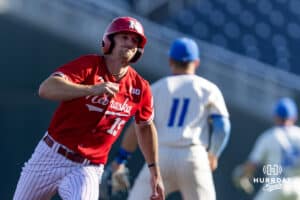 Nebraska Cornhusker Dylan Carey (15) runs to third base against the Creighton Bluejays in the first inning during a college baseball game on Tuesday, May 12, 2026, in Omaha, Neb. Photo by John S. Peterson.