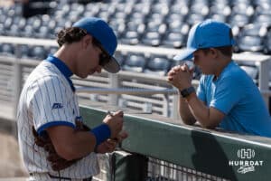 Creighton Bluejay Lew Rice (3) signs a baseball before a college baseball game on May 12, 2026, in Omaha, Nebraska. Photo by Brandon Tiedemann.
