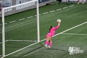 Lincoln Southeast's Marie Fobben (0) saves a free kick during the girls' Class A soccer match against Lincoln Southeast on Monday, May 11, 2026, in Omaha, Nebraska. Photo by Jackson D. Luethje