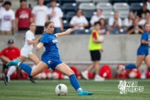 Kearney's Hallie Garner (14) passes during the girls' Class A quarter-final soccer game against Millard South on Monday, May 11, 2026, in Omaha, Nebraska. Photo by Jackson D. Luethje.Kearney's Hallie Garner (14) passes during the girls' Class A quarter-final soccer game against Millard South on Monday, May 11, 2026, in Omaha, Nebraska. Photo by Jackson D. Luethje.