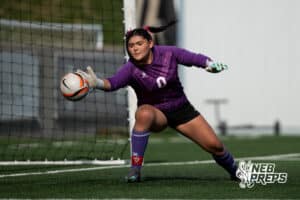 Millard South's Addison Thiessen (0) dives for the ball during the Girls quarter-final soccer game against Kearney on Monday, May 11, 2026, in Omaha, Nebraska. Photo by Jackson D. Luethje.