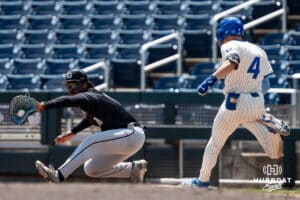 Georgetown’s Ashton Seymore (18) streaches to beat Creighton’s Teddy Deters (4) to get an out during a college baseball game Sunday, May 10, 2026, in Omaha, Nebraska. Photo by Jackson D. Luethje.