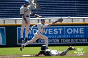 Creighton Bluejay Ben North (11) reaches for an overthrown ball during a college baseball game vs Georgetown on Sunday, May 10, 2026, in Omaha, Nebraska. Photo by Jackson D. Luethje.