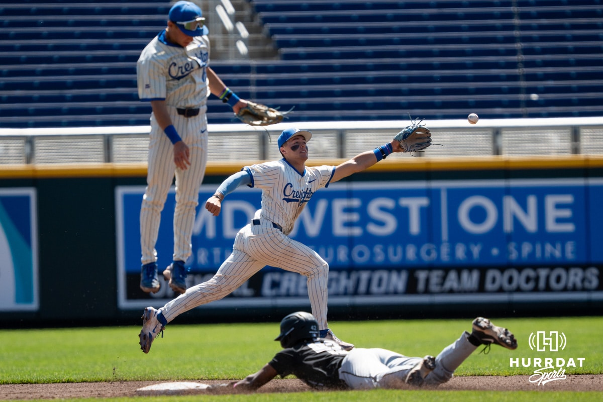 Creighton Bluejay Ben North (11) reaches for an overthrown ball during a college baseball game vs Georgetown on Sunday, May 10, 2026, in Omaha, Nebraska. Photo by Jackson D. Luethje.
