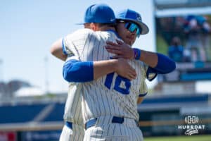 Creighton Bluejay Joe Hauser (18) with Jimmy Burke (31) during a college baseball game Sunday, May 10, 2026, in Omaha, Nebraska. Photo by Jackson D. Luethje.