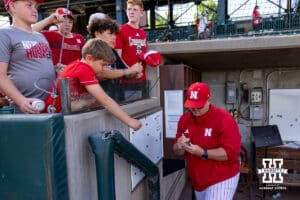 Nebraska Cornhusker head coach Will Bolt signs autographs after the win against the Iowa Hawkeyes during a college baseball game on Saturday, May 9, 2026, in Lincoln, Neb. Photo by John S. Peterson.