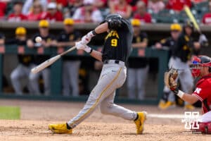 Iowa Hawkeye Kooper Schulte (9) hits one run single against the Nebraska Cornhuskers in the eighth inning during a college baseball game on Saturday, May 9, 2026, in Lincoln, Neb. Photo by John S. Peterson.