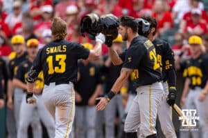 Iowa Hawkeye Ben Swails (13) celebrates his two run home run against the Nebraska Cornhuskers in the eighth inning during a college baseball game on Saturday, May 9, 2026, in Lincoln, Neb. Photo by John S. Peterson.