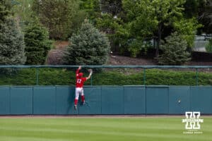 Nebraska Cornhusker outfielder Mac Moyer (17) watches the ball go over the fence from the Iowa Hawkeye Ben Swails (13) two run home run in the eighth inning during a college baseball game on Saturday, May 9, 2026, in Lincoln, Neb. Photo by John S. Peterson.
