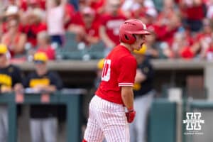 Nebraska Cornhusker outfielder Drew Grego (10) celebrates scoring a run against the Iowa Hawkeyes in the seventh inning during a college baseball game on Saturday, May 9, 2026, in Lincoln, Neb. Photo by John S. Peterson.