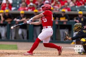 Nebraska Cornhusker Will Jesske (13) singles in the seventh inning against the Iowa Hawkeyes during a college baseball game on Saturday, May 9, 2026, in Lincoln, Neb. Photo by John S. Peterson.