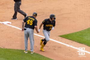 Iowa Hawkeye Jaixen Frost (27) runs home after hitting a home run against the Nebraska Cornhuskers in the fifth inning during a college baseball game on Saturday, May 9, 2026, in Lincoln, Neb. Photo by John S. Peterson.