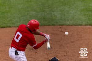 Nebraska Cornhusker Jeter Worthley (0) hits a triple scoreing Mac Moyer in the fourth inning against the Iowa Hawkeyes during a college baseball game on Saturday, May 9, 2026, in Lincoln, Neb. Photo by John S. Peterson.