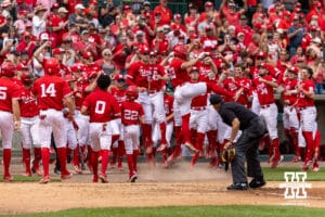 Nebraska Cornhuskers celebrates Will Jesske grand slam against the Iowa Hawkeyes in the third inning during a college baseball game on Saturday, May 9, 2026, in Lincoln, Neb. Photo by John S. Peterson.
