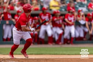 Nebraska Cornhusker Will Jesske (13) hits a grand slam against the Iowa Hawkeyes in the third inning during a college baseball game on Saturday, May 9, 2026, in Lincoln, Neb. Photo by John S. Peterson.