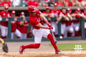 Nebraska Cornhusker outfielder Drew Grego (10) singles in the second inning scoring Case Sanderson against the Iowa Hawkeyes during a college baseball game on Saturday, May 9, 2026, in Lincoln, Neb. Photo by John S. Peterson.